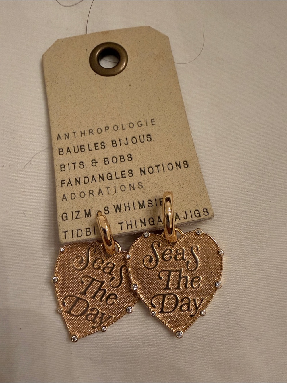 Anthropologie Gold Heart Huggie Earrings with Script Charm